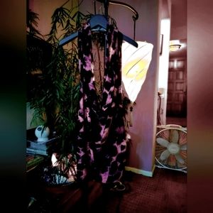 Short dress, backless, no zippers or buttons to fasten. One piece